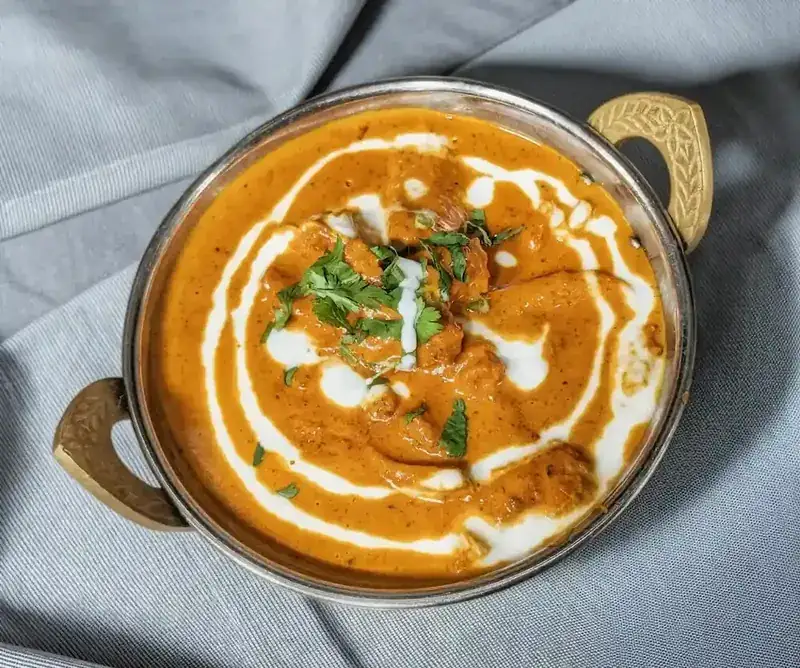 Butter Chicken – Denver's best butter chicken — tender chicken in velvety tomato-cream sauce with | SPICE ROOM Denver