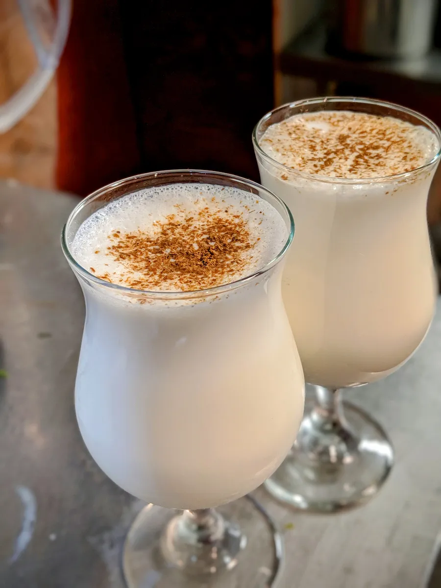 Sweet Lassi – Chilled yogurt drink with a touch of cardamom | SPICE ROOM Denver happy hour